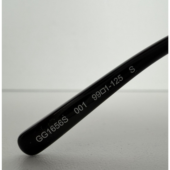 Gucci GG1656S 001 Sunglasses in Black Metal Frame and Grey Tinted Lenses